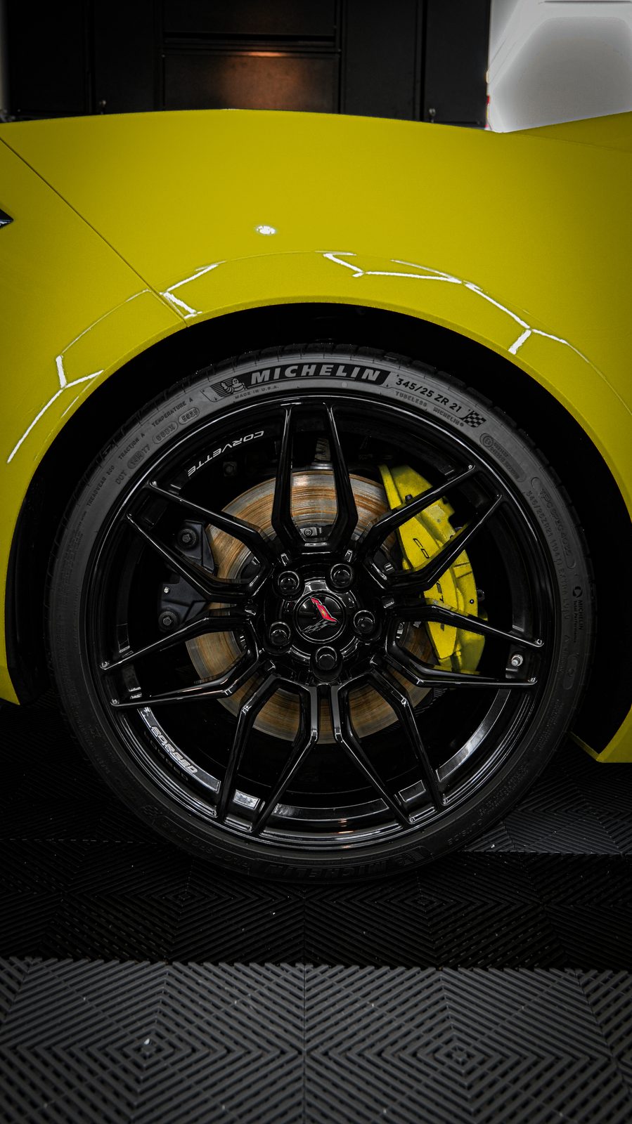 Wheel and brake detail on a Corvette after a BEX Detailing Lab ceramic coating